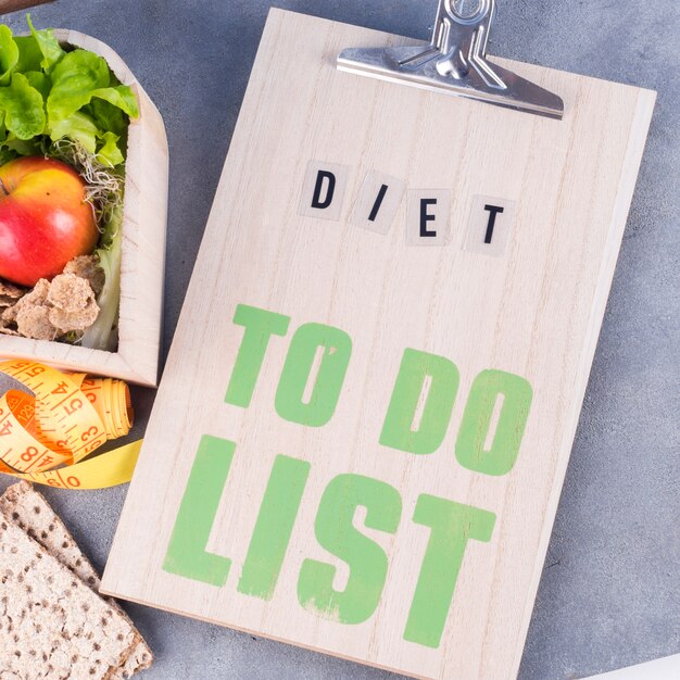 Diet To do list with healthy food on table 