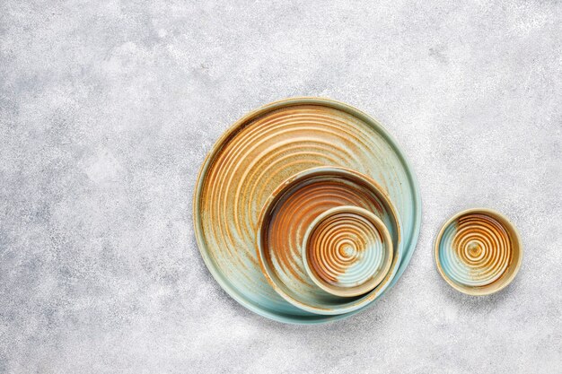 Different ceramic empty plates and bowls.