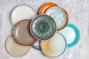 Free photo different ceramic empty plates and bowls.