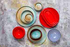 Free photo different ceramic empty plates and bowls.