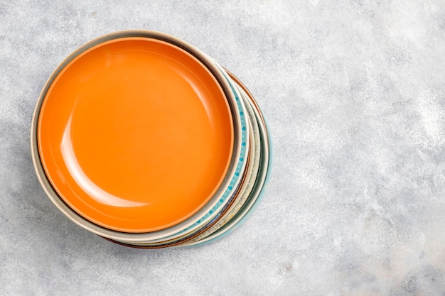 Different ceramic empty plates and bowls.