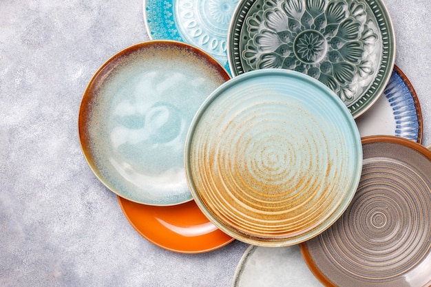 Different ceramic empty plates and bowls.