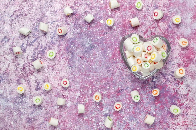 Different colorful sugar candies, top view