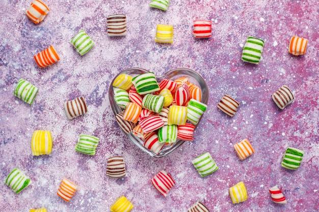 Different colorful sugar candies, top view