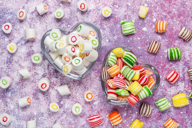 Different colorful sugar candies, top view