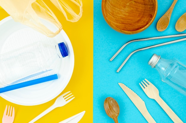 Different disposable plastic and paper cutlery