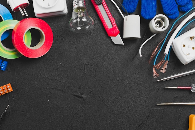 Different electrical tools on table