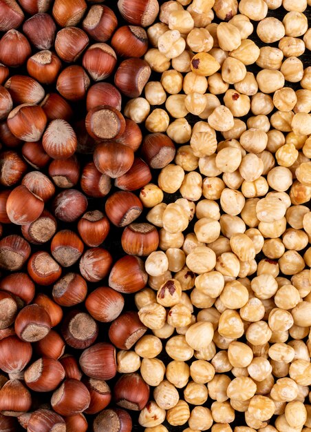 Different hazelnuts shelled and cleaned nuts. close-up.