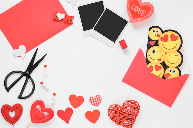 Free photo different hearts with envelope on table