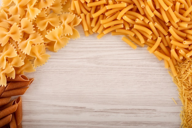 different kinds of pasta with copy space