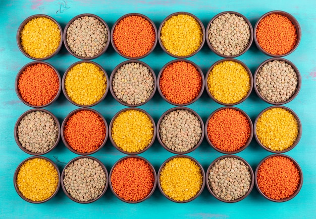 Different lentils in a bowls