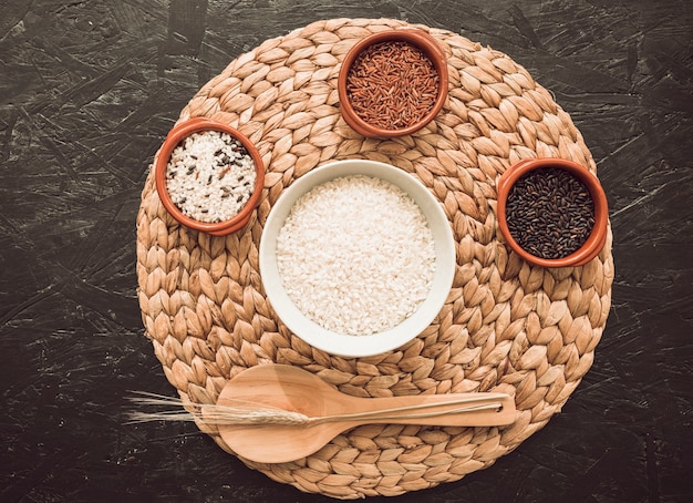 Different organic rice bowls over the circular placemat