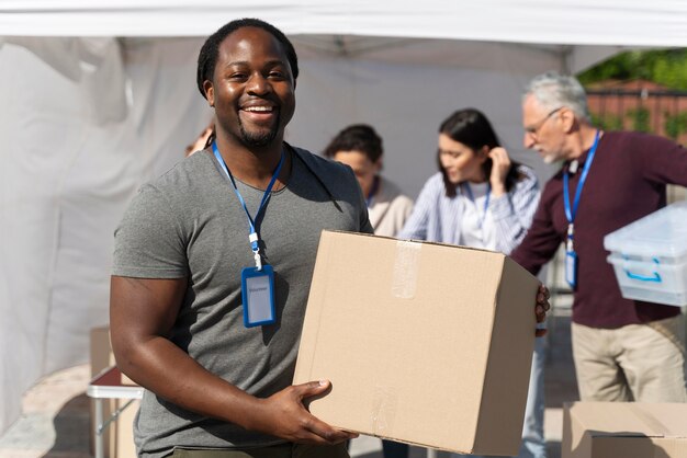 Different people doing volunteer work with food