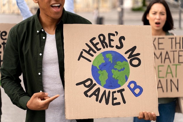 Different people marching in climate change protest