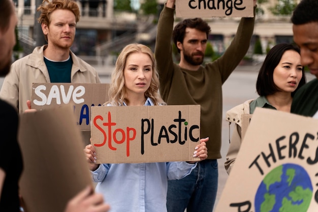 Free photo different people marching in global waring protest