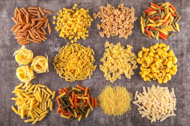 different raw pasta types top view