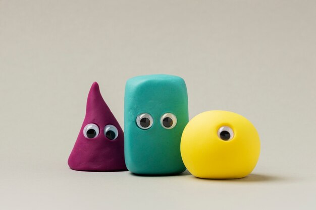 Different shaped play dough monsters