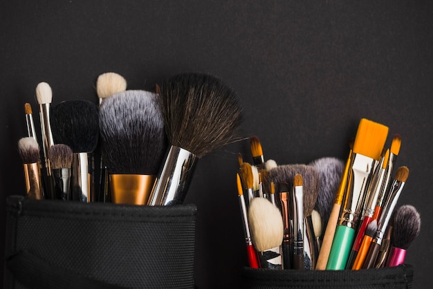 Different size of makeup brushes in holder