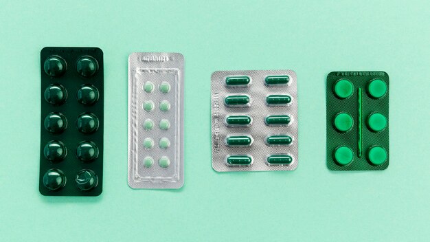 Different size tablets of pills