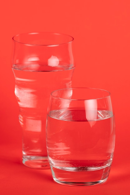Different sized glasses with water