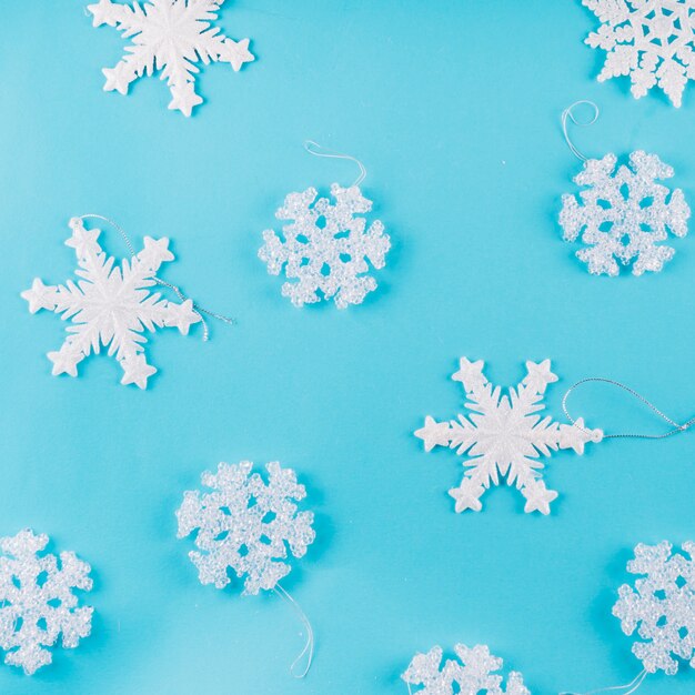 Different snowflakes on blue table