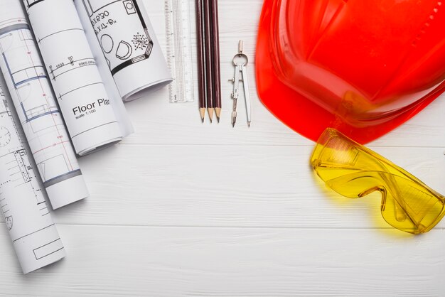 Different supplies on wooden table