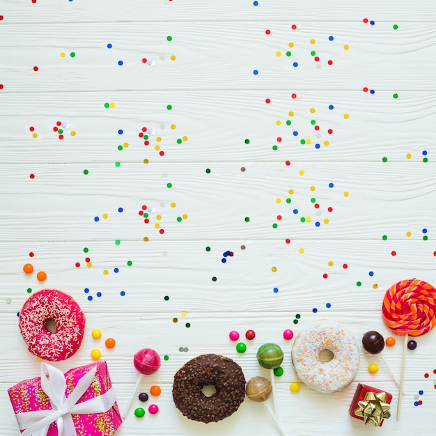 Free photo different sweets and confetti