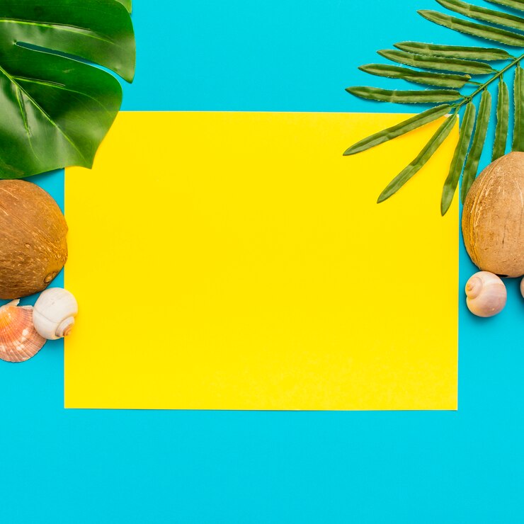 Different tropical leaves on a blue and yellow background