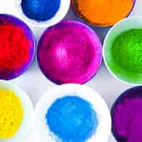 Free photo different type of holi color powder in the bowls