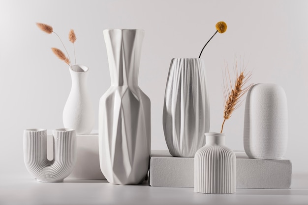Different white modern vases arrangement