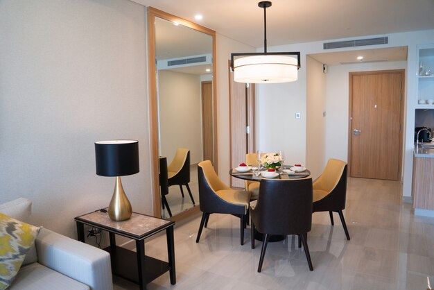 Dining area of comfortable studio flat or hotel room. 