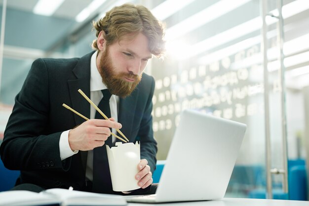 Dining in front of laptop