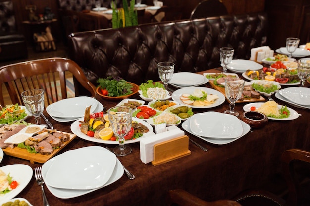 dinner table setup with delicious food ready to be served