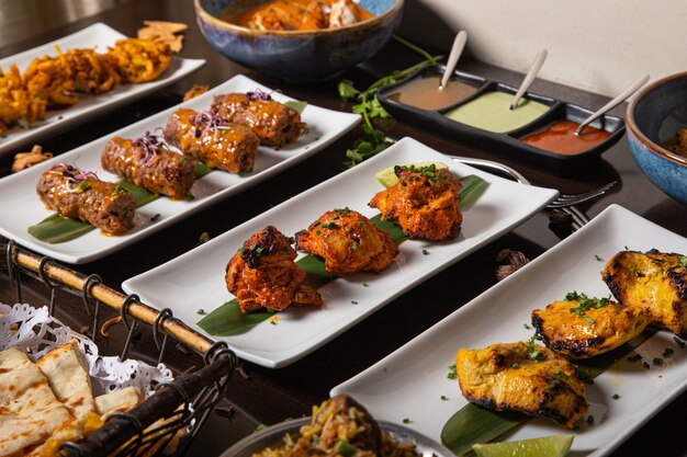 Dinner table with fried meat dishes and sauces