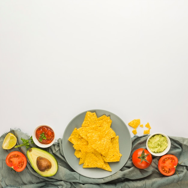 Free photo dipping nacho chips