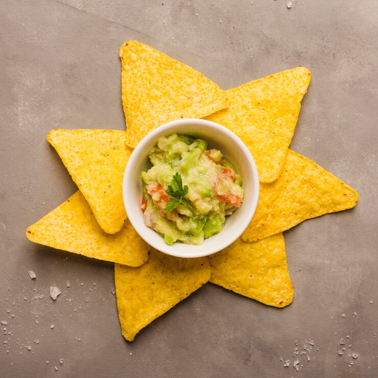 Free Photo dipping nacho chips