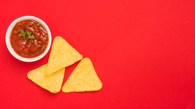 Free photo dipping nacho chips