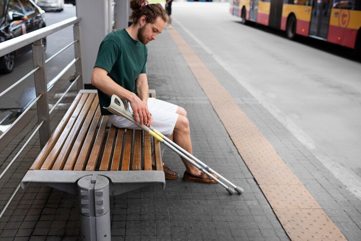 Free Photo disabled person travelling in the city