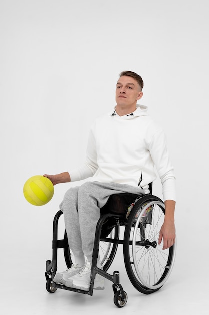 Free photo disabled voleyball player in a wheelchair