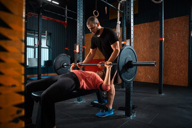 Disabled woman training in the gym of rehabilitation center