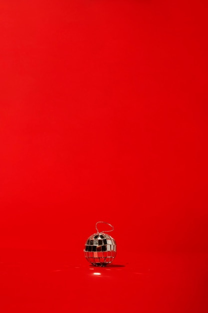 Disco ball on red table