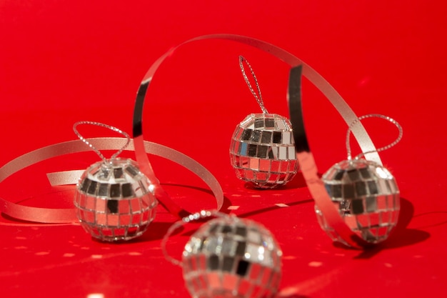 Disco balls on red table