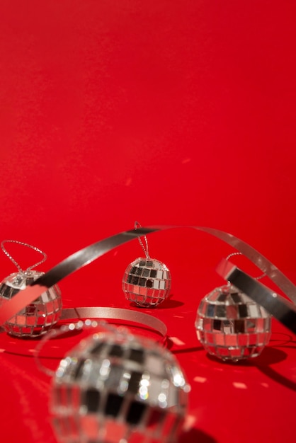 Disco balls on red table