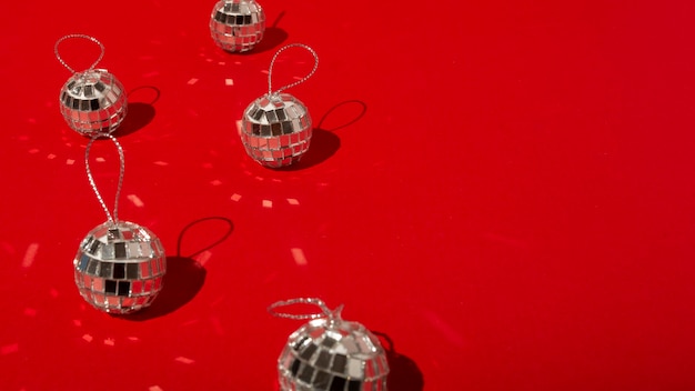 Disco balls on red table