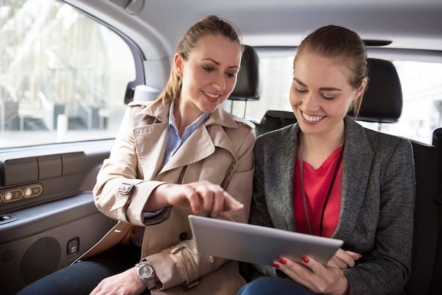 Discuss business strategy while driving to a meeting