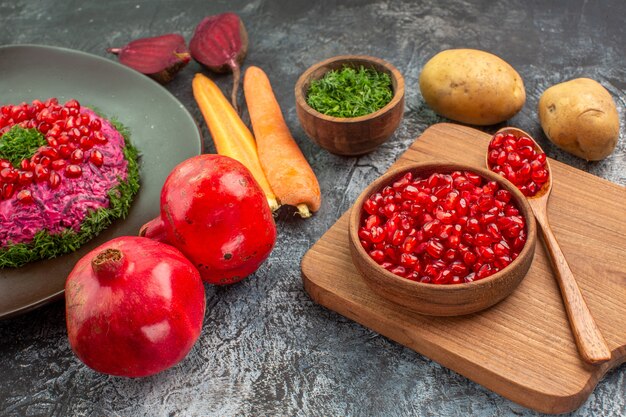 dish the board with pomegranate seeds vegetables plate of dish