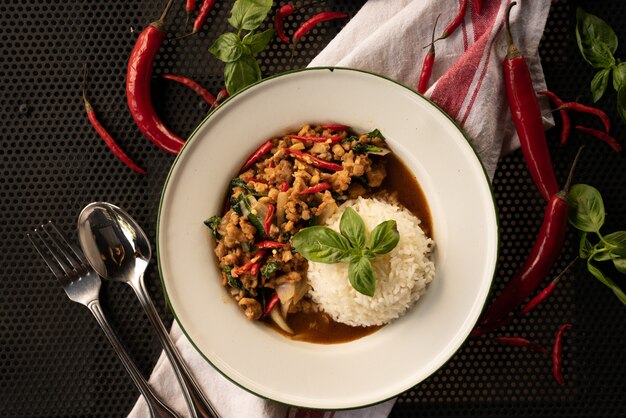 dish with rice and red peppers in a white round plate