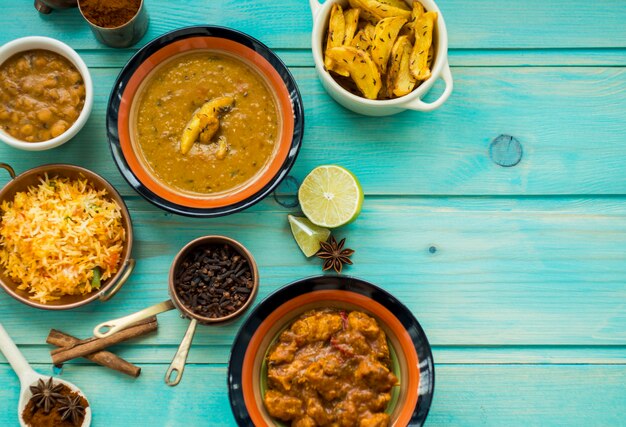 Dishes and spices on bright tabletop