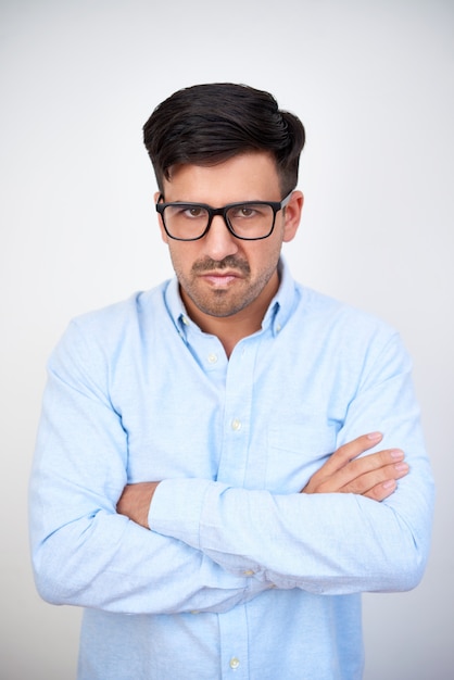 Displeased man in eyeglasses