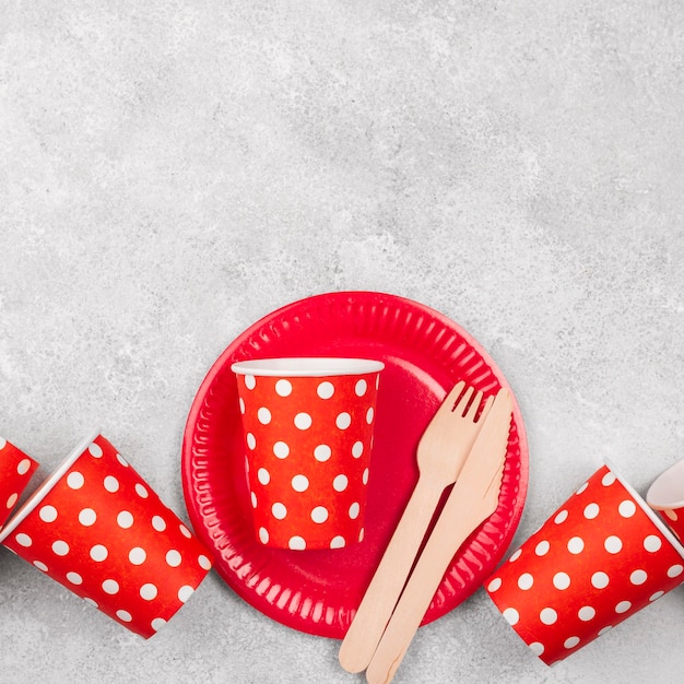 Disposable tableware red cups copy space